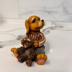 Small Resin Dog Holding His Toy Dog 3‎ In